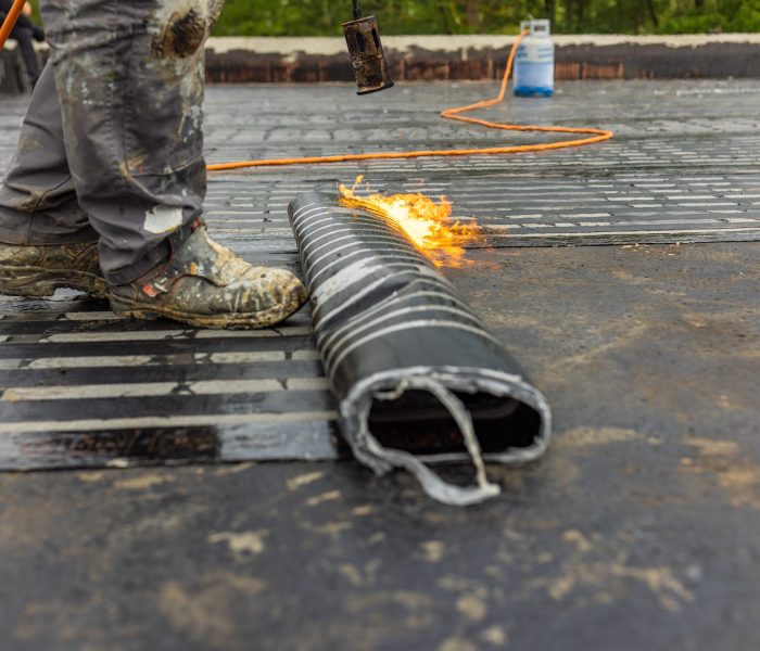Bituminous membrane waterproofing system details and installation on flat rooftop. Bituminous membrane waterproofing system details and installation on flat rooftop.